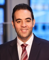 Gregory H. Cayne